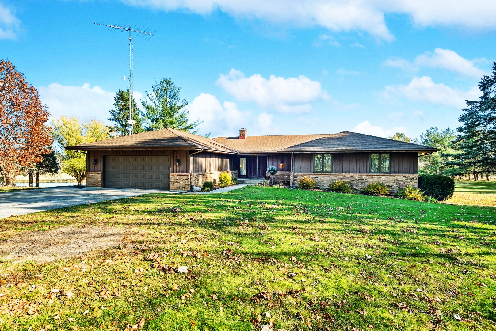 17445 Livingston School Road Caledonia, IL 61011 - Photo 6 of 33 a front view of a house with a yard