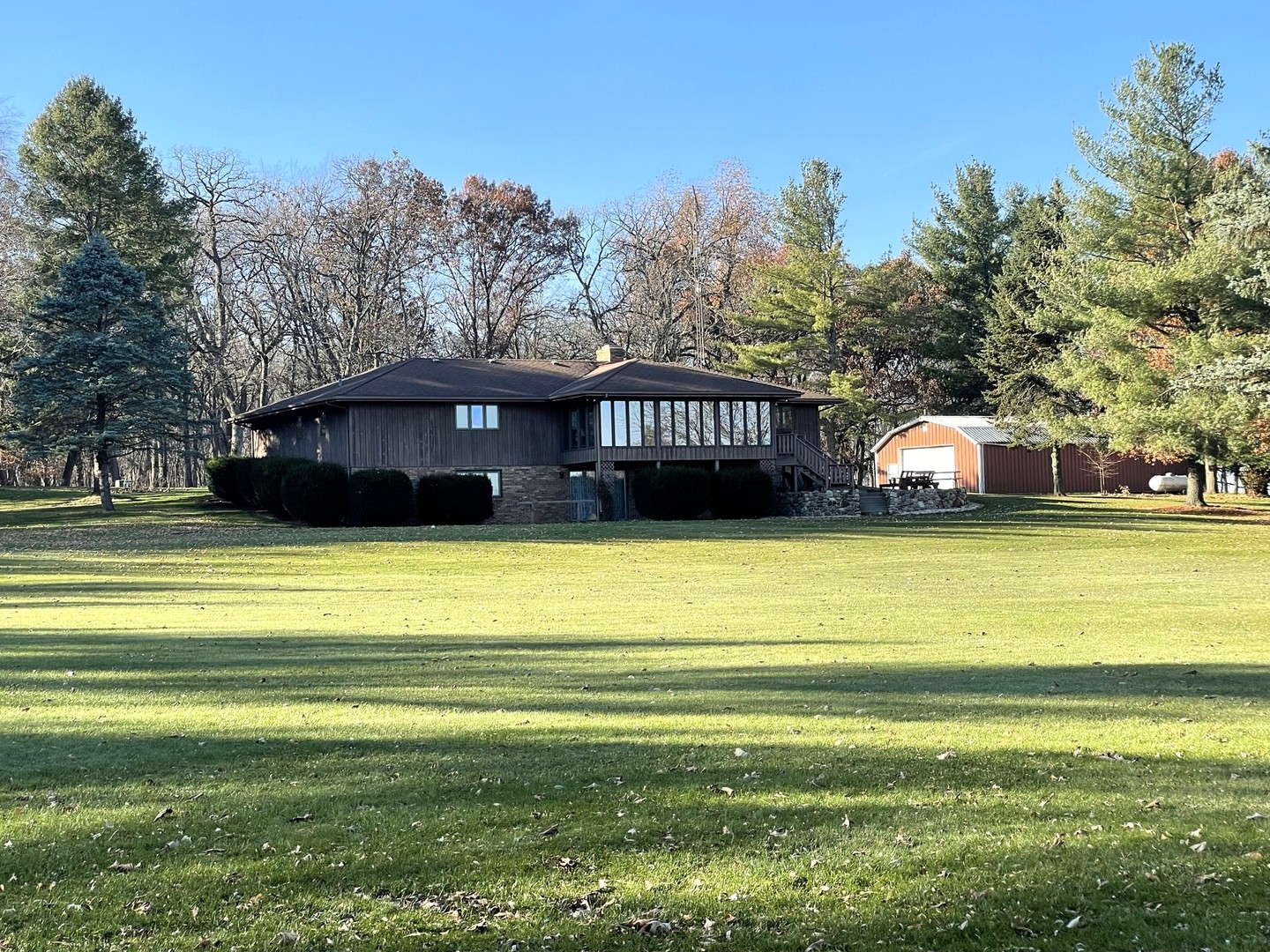 17445 Livingston School Road Caledonia, IL 61011 - Photo 7 of 33 a view of a swimming pool with a yard