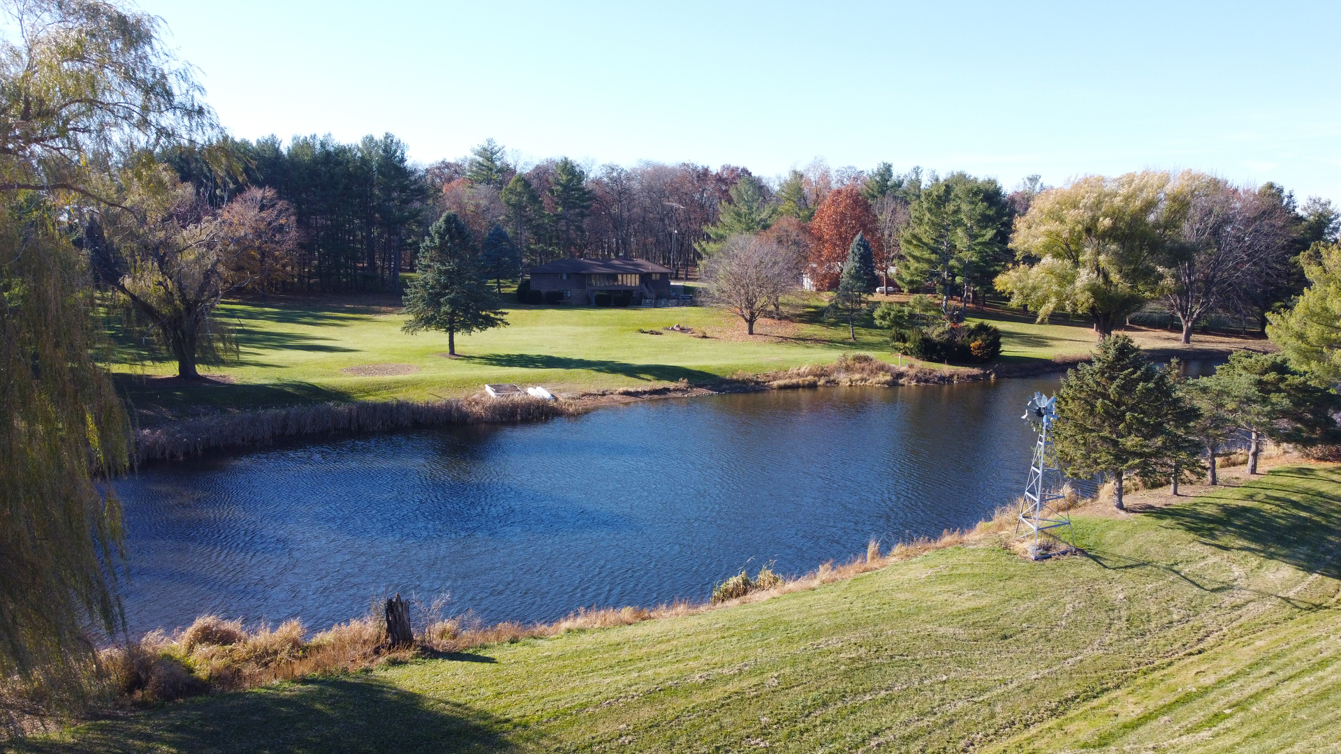 17445 Livingston School Road Caledonia, IL 61011 - Photo 8 of 33 a view of swimming pool with a yard