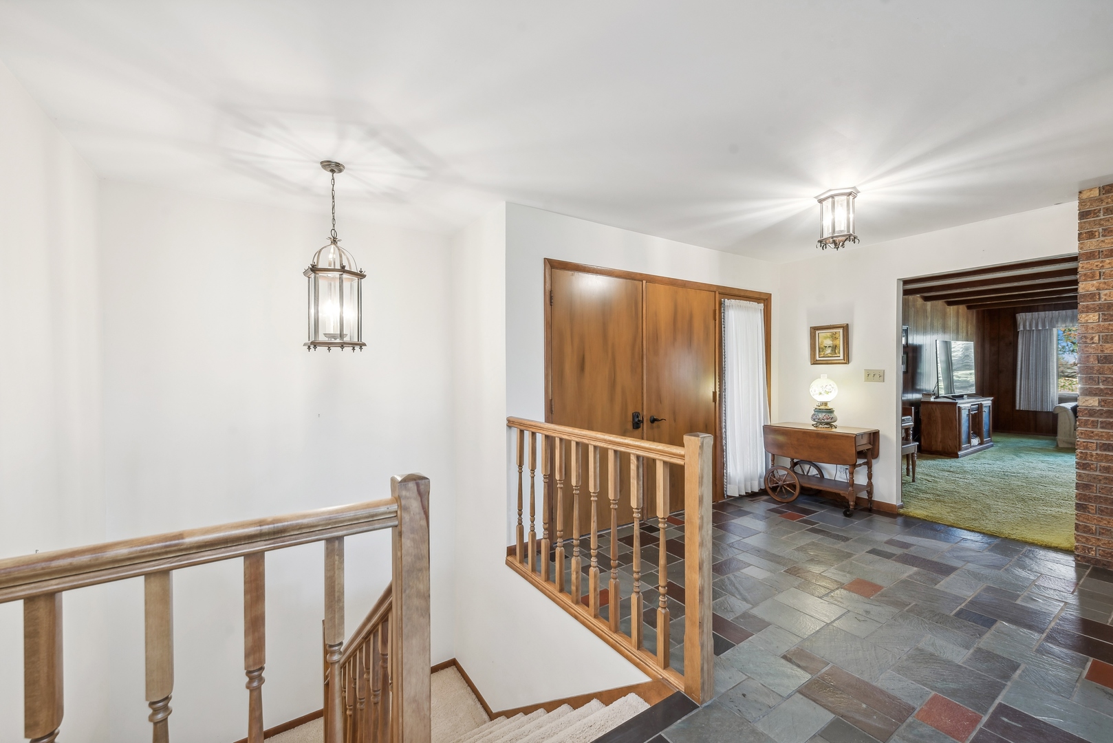 17445 Livingston School Road Caledonia, IL 61011 - Photo 10 of 33 a view of a hallway with a livingroom and entryway