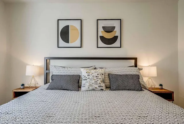 a bathroom with a granite countertop sink toilet a mirror and shower