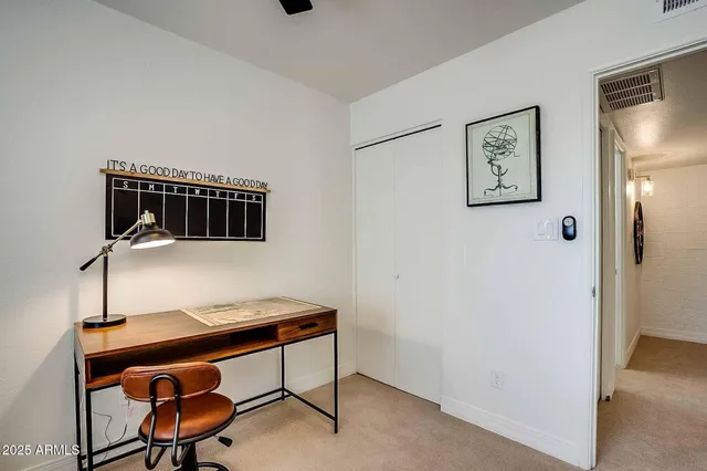 a bathroom with a shower and a toilet