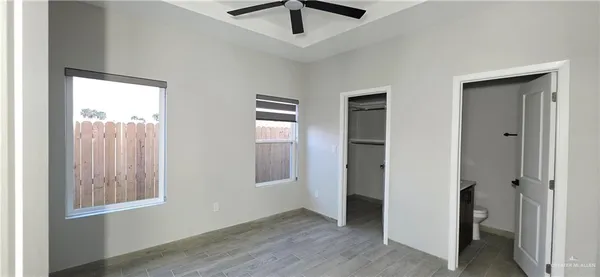 a view of a room with an empty walk in closet