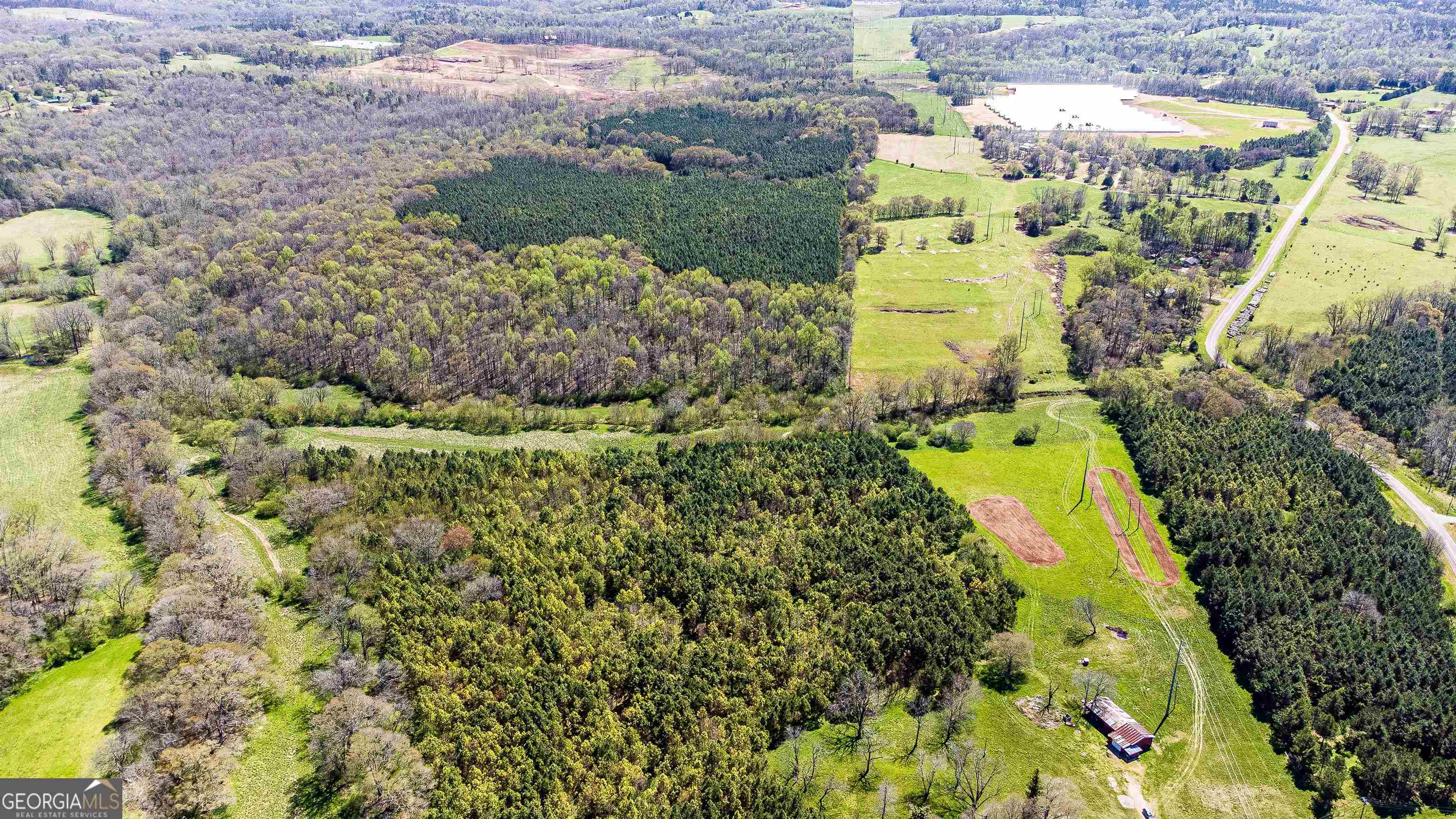 1196 Cooper Farm Road Nicholson, GA 30565 - Photo 1 of 1 a view of a yard with plants