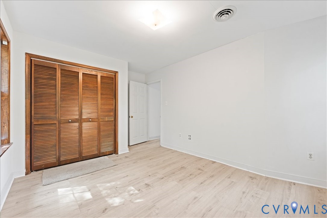 7141 Barkbridge Road Chesterfield, VA 23832 - Photo 32 of 44 Unfurnished bedroom with light wood-style floors a