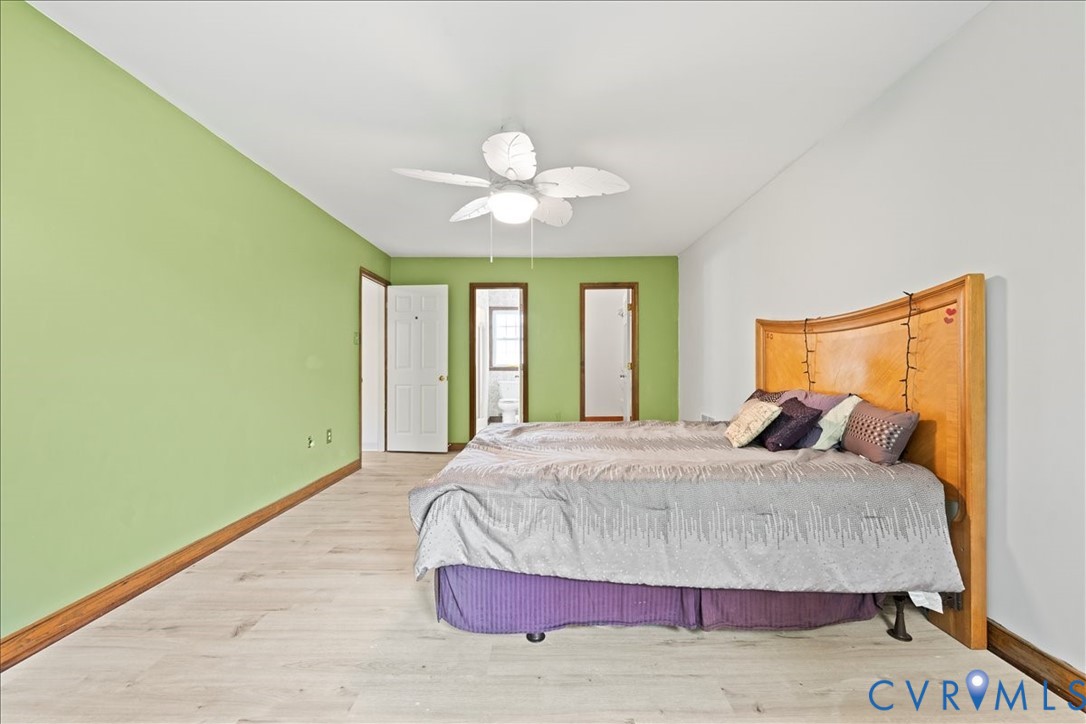 7141 Barkbridge Road Chesterfield, VA 23832 - Photo 37 of 44 Bedroom featuring wood finished floors, ensuite ba