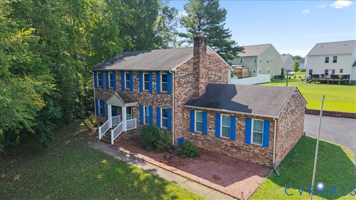 7141 Barkbridge Road Chesterfield, VA 23832 - Photo 6 of 44 Colonial inspired home with a front yard, a chimne