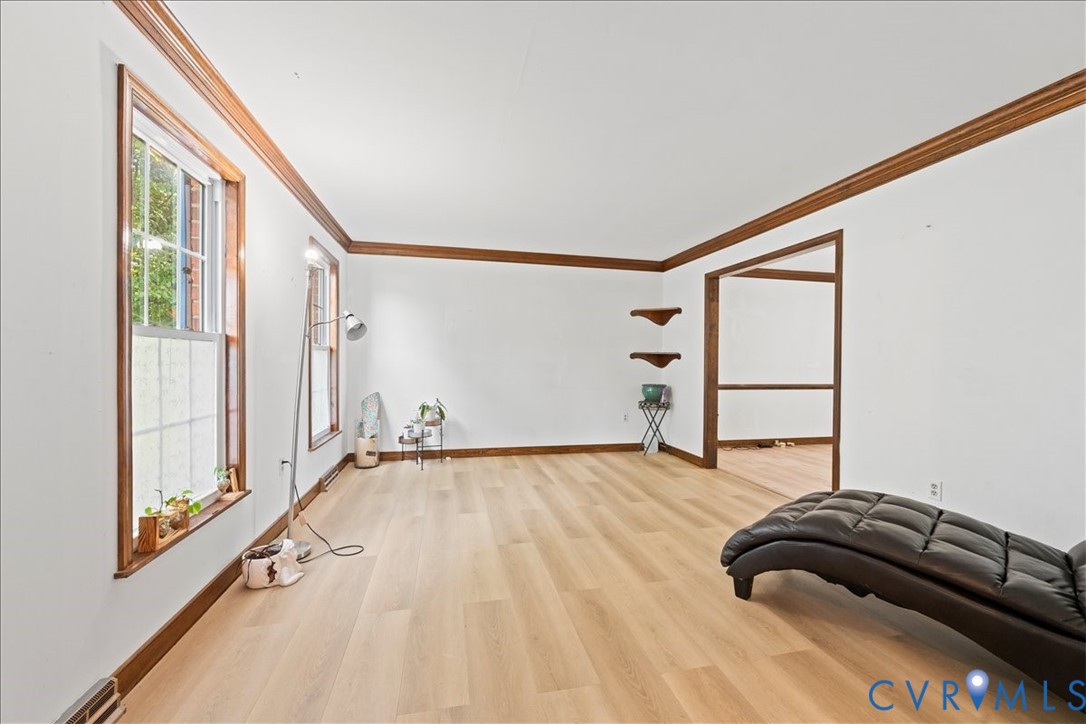 7141 Barkbridge Road Chesterfield, VA 23832 - Photo 9 of 44 Unfurnished room with ornamental molding and light