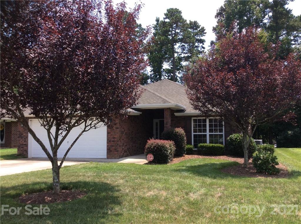 121 Newport Drive Kannapolis, NC 28081 - Photo 1 of 22 a front view of a house with garden