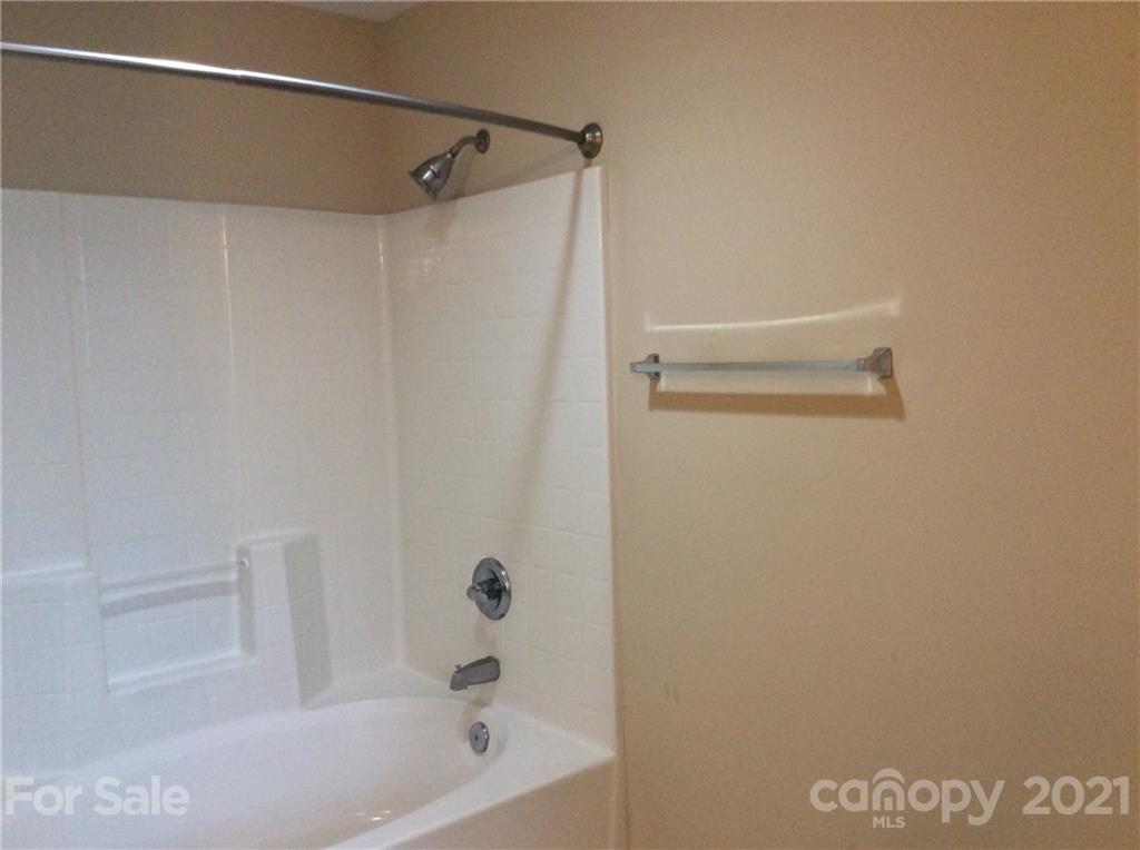 121 Newport Drive Kannapolis, NC 28081 - Photo 16 of 22 a bathroom with a shower and a bath tub