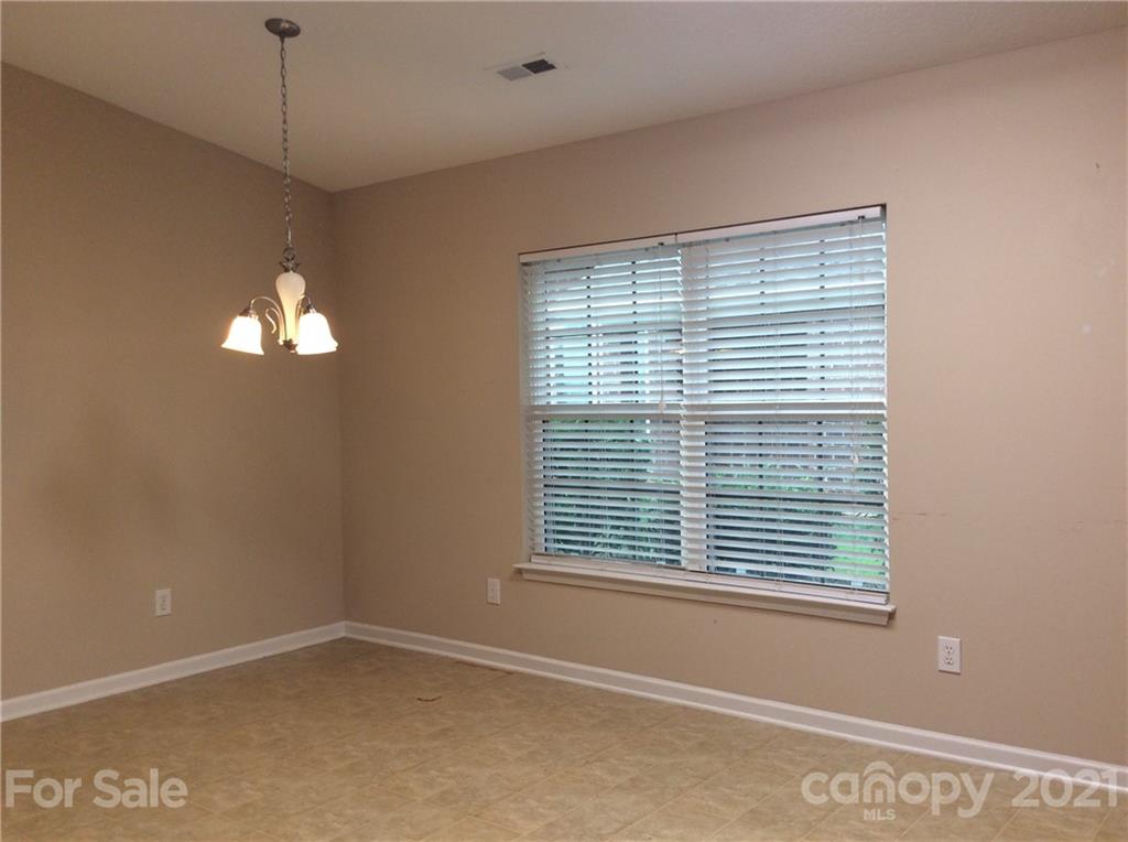121 Newport Drive Kannapolis, NC 28081 - Photo 18 of 22 a view of an empty room with a window