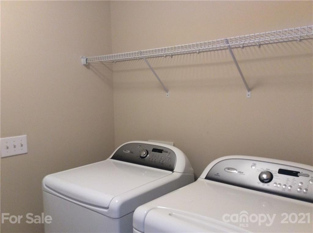 121 Newport Drive Kannapolis, NC 28081 - Photo 22 of 22 a utility room with dryer and washer