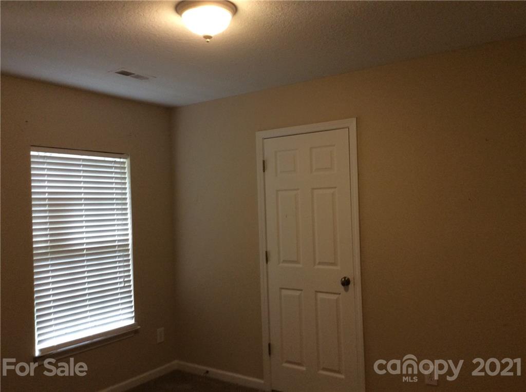 121 Newport Drive Kannapolis, NC 28081 - Photo 8 of 22 a view of a room that has a window in it