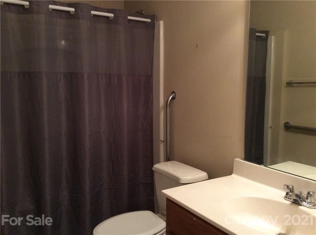 121 Newport Drive Kannapolis, NC 28081 - Photo 9 of 22 a bathroom with a sink and a toilet