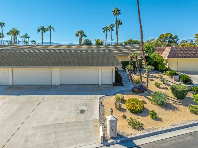 a view of a couches and table in the patio