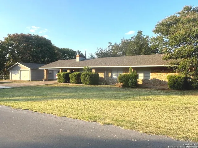 a view of house with outdoor space