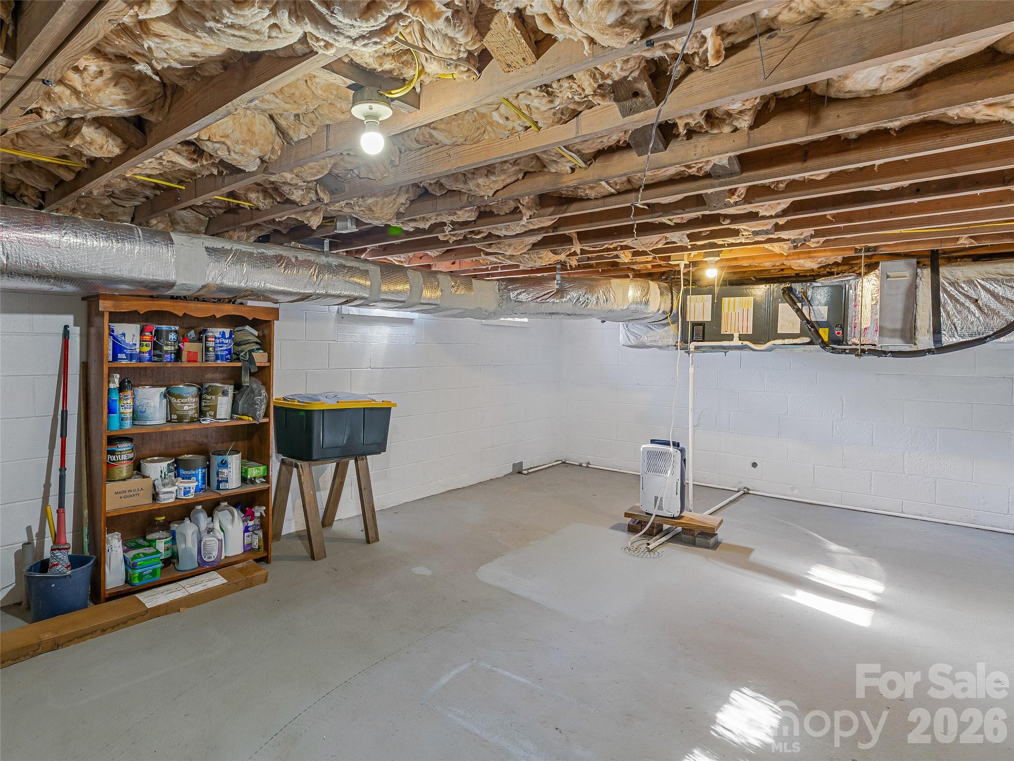 3869 Crab Creek Road Penrose, NC 28766 - Photo 18 of 19 a view of a room with racks on the wall