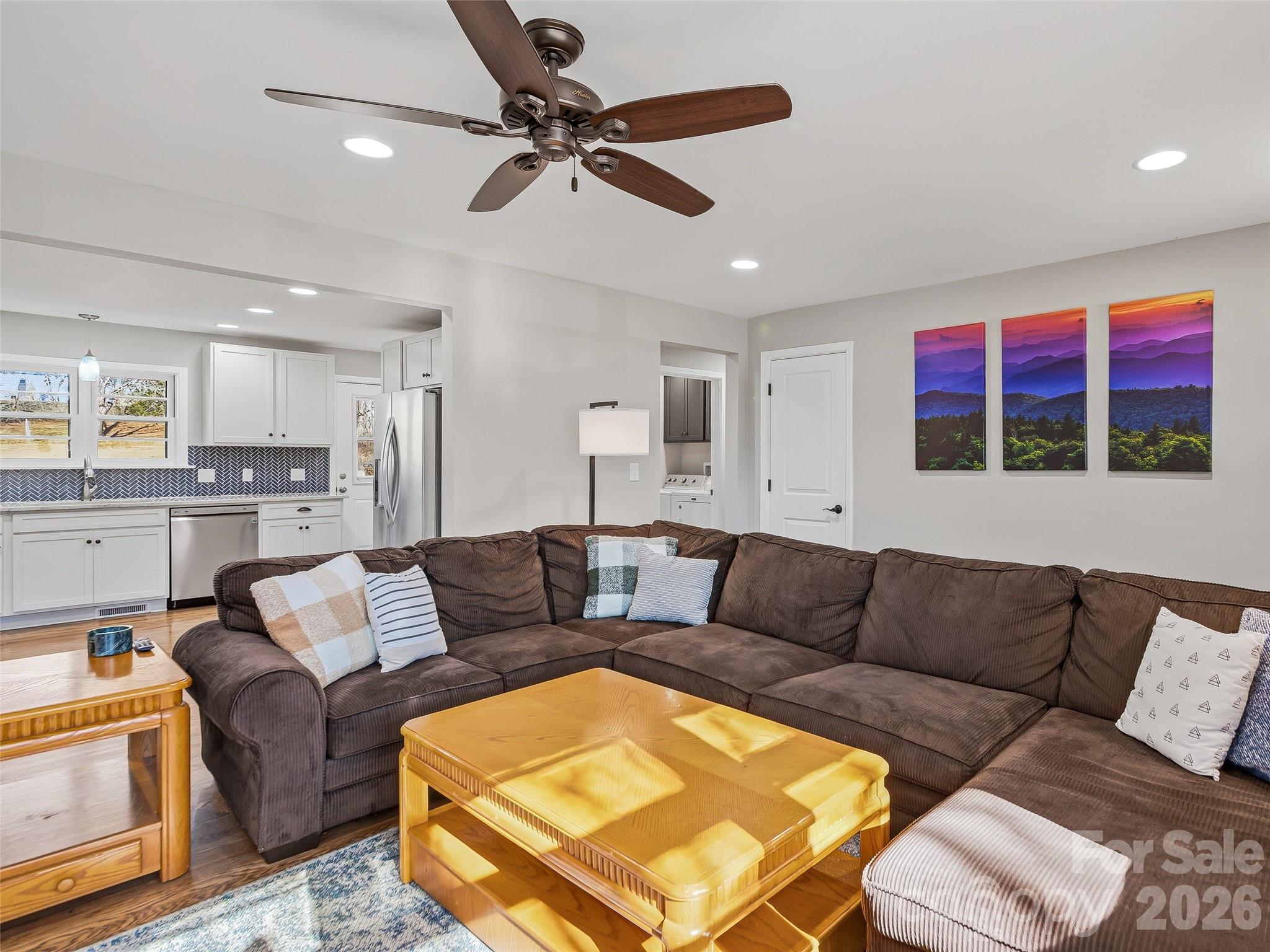 3869 Crab Creek Road Penrose, NC 28766 - Photo 5 of 19 a living room with furniture and a view of kitchen