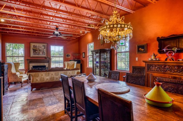 a bed room with furniture and a wooden floor