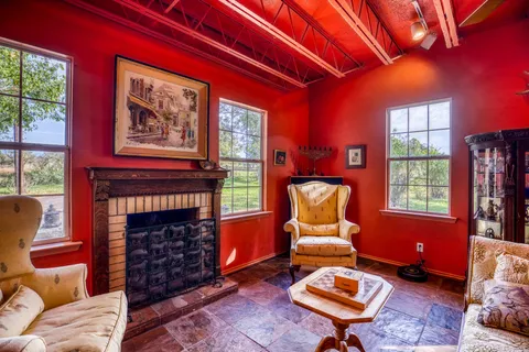 a living room with furniture and a rug