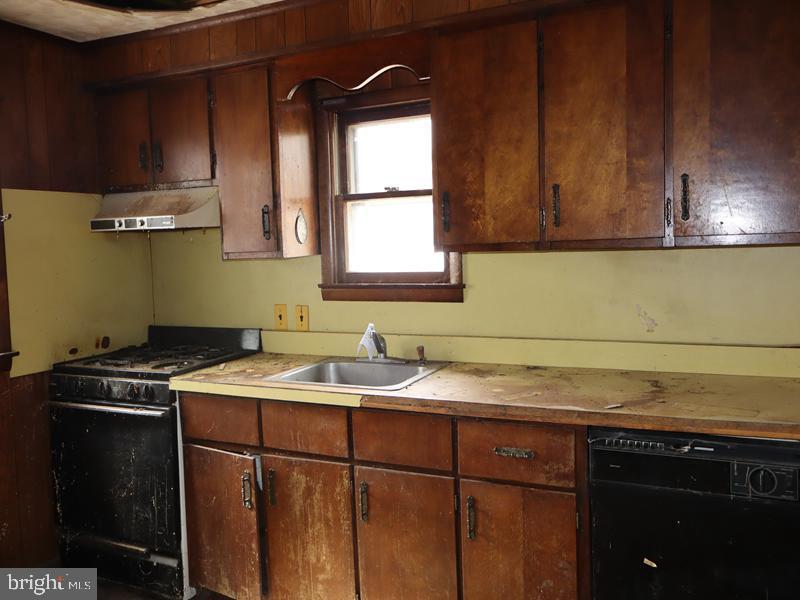352 Roosevelt Avenue Lindenwold, NJ 08021 - Photo 12 of 21 a kitchen with a sink cabinets and a window