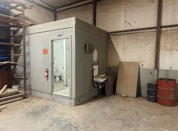 a view of a storage & utility room with closet