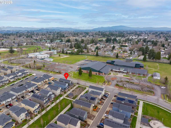 a view of a city with an ocean view