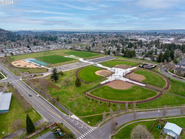 swimming pool view with a outdoor seating space
