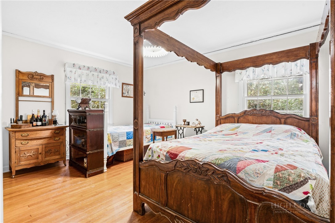 1794 Highway 105 Boone, NC 28607 - Photo 24 of 29 a bedroom with a bed and a view of bedroom