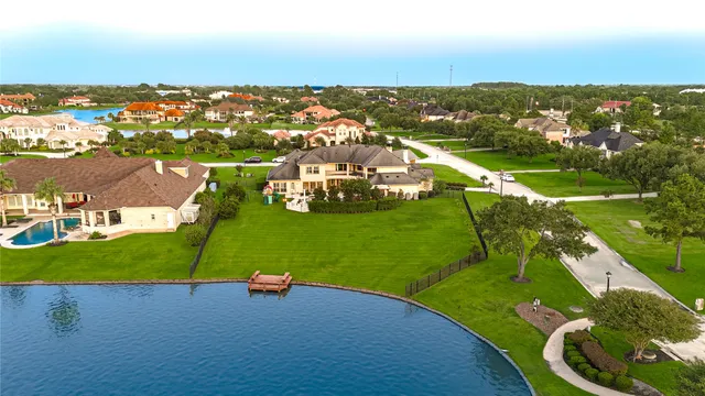 an aerial view of a houses with a outdoor space