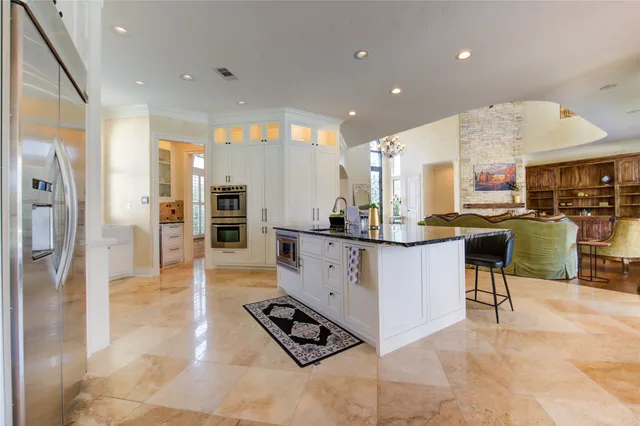 a view of kitchen with living room and furniture