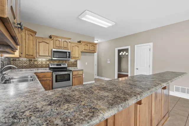 $472,000 | 10080 Green Forest Drive, Hernando, MS 38632