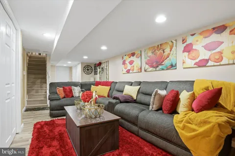 a living room with furniture and couch