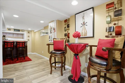 a living room with lots of furniture and a flat screen tv