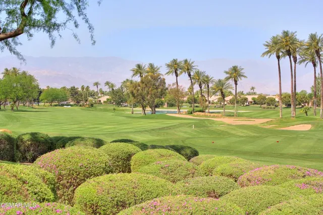 a view of a golf course with a garden