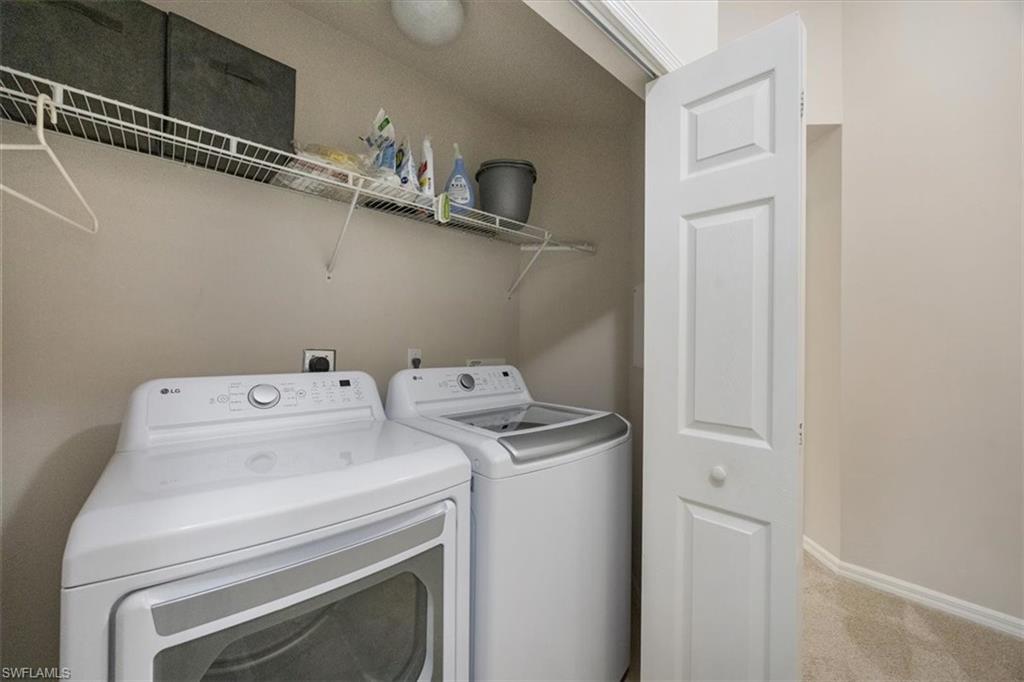 15809 Marcello Circle Naples, FL 34110 - Photo 22 of 33 a utility room with dryer and washer