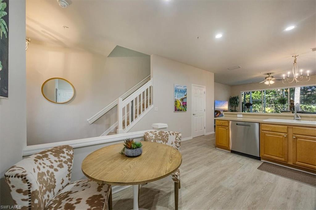 15809 Marcello Circle Naples, FL 34110 - Photo 8 of 33 a living room with sink and kitchen view