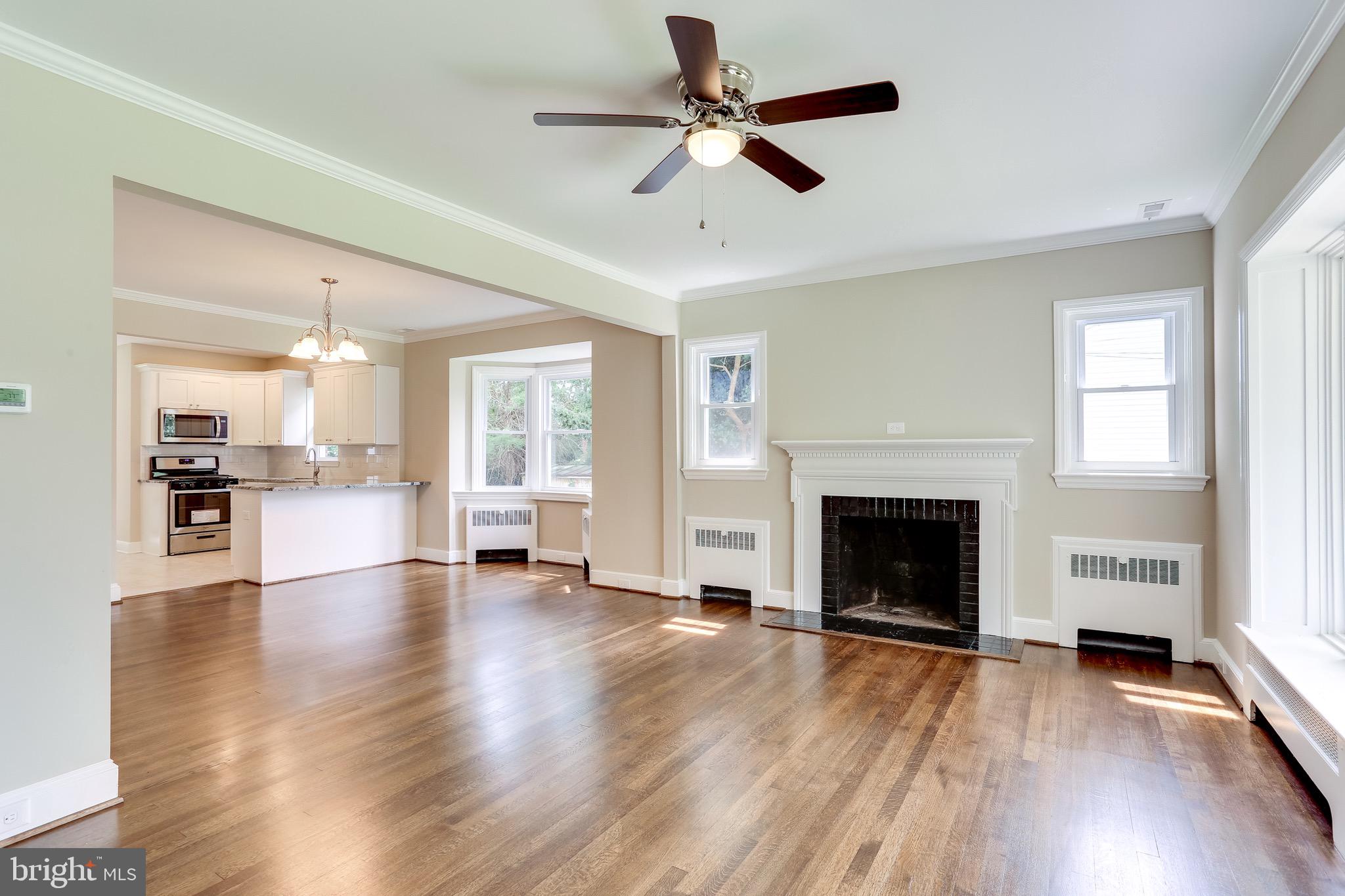 3505 St James Road Baltimore, MD 21244 - Photo 5 of 32 Gleaming hardwoods & fireplace
