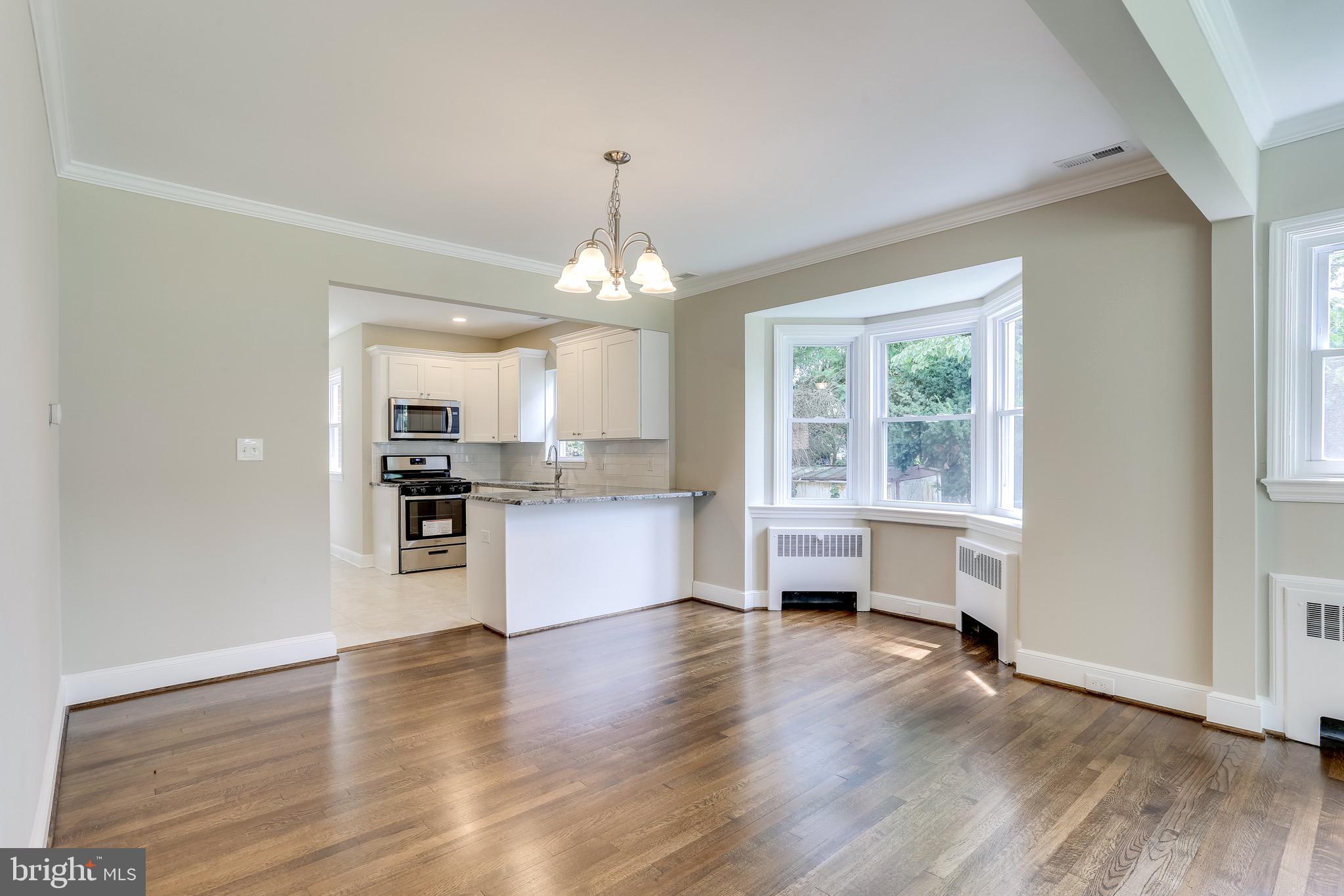 3505 St James Road Baltimore, MD 21244 - Photo 9 of 32 Dining room w/ crown moulding
