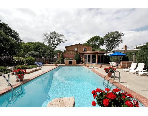 200 Hibbard Road Wilmette, IL 60091 - Photo 1 of 1 a view of a house with swimming pool and sitting area