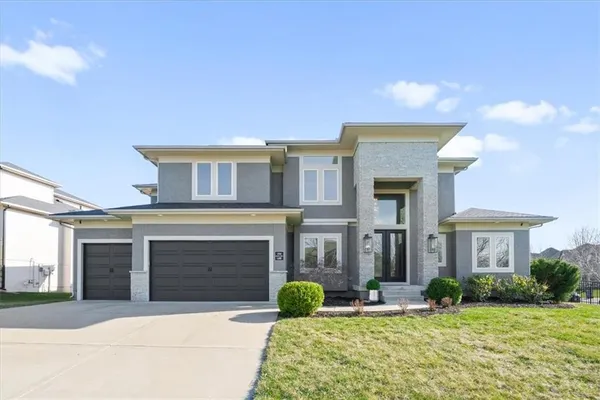 $899,000 | 1744 Northeast Woodland Shores Lane, Lee's Summit, MO 64086