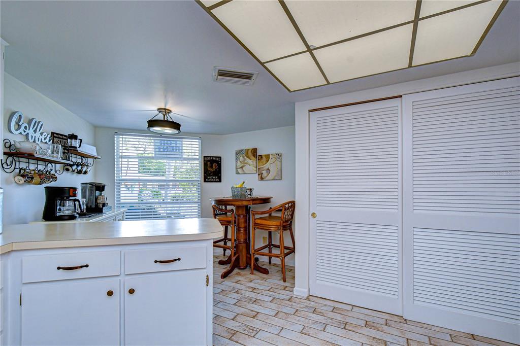 3439 Teeside Drive New Port Richey, FL 34655 - Photo 18 of 85 a kitchen with stainless steel appliances kitchen island granite countertop a sink and cabinets