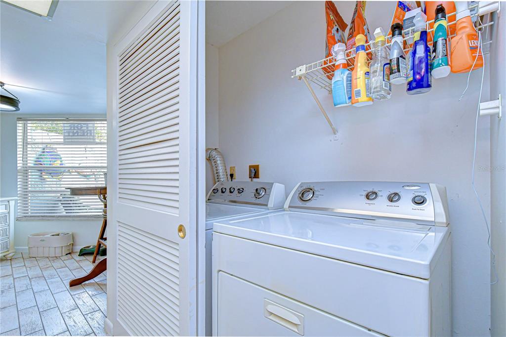 3439 Teeside Drive New Port Richey, FL 34655 - Photo 19 of 85 a view of storage and utility room with washer and dryer