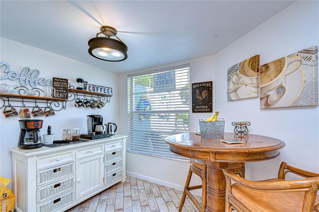 3439 Teeside Drive New Port Richey, FL 34655 - Photo 21 of 85 a kitchen with stainless steel appliances a sink and cabinets