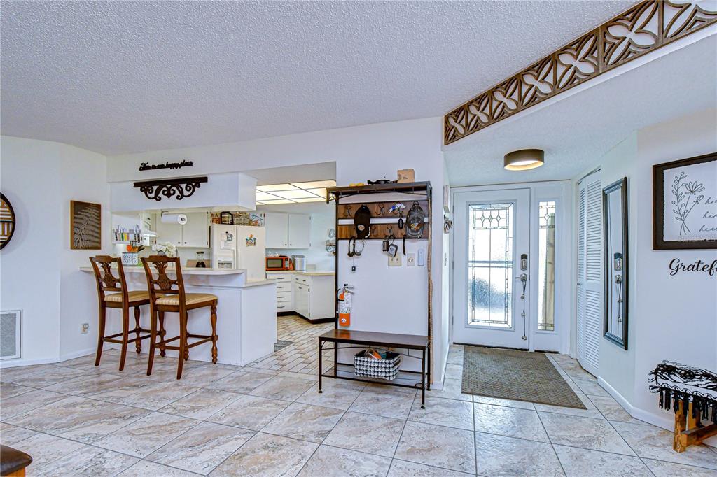 3439 Teeside Drive New Port Richey, FL 34655 - Photo 22 of 85 a living room with furniture and a table