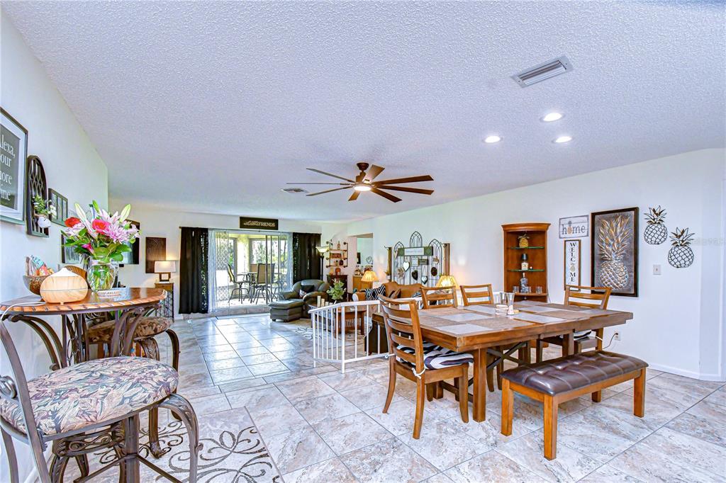 3439 Teeside Drive New Port Richey, FL 34655 - Photo 30 of 85 a view of a dining room with furniture