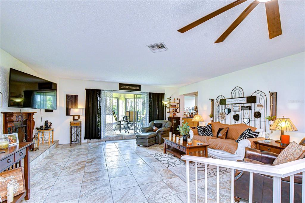3439 Teeside Drive New Port Richey, FL 34655 - Photo 31 of 85 a living room with furniture and a flat screen tv