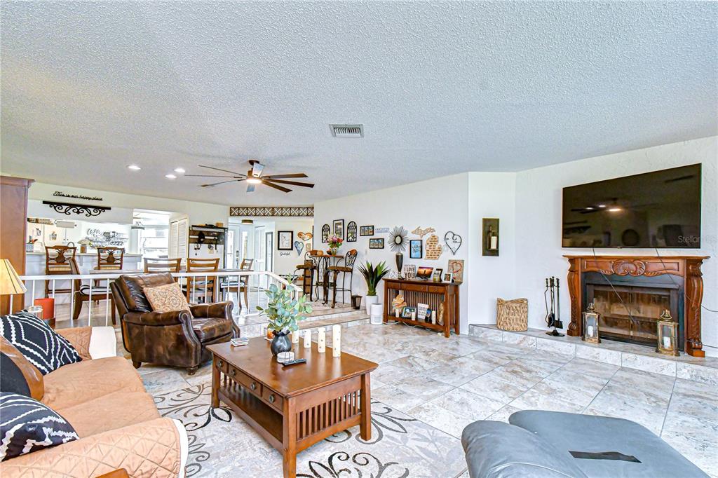 3439 Teeside Drive New Port Richey, FL 34655 - Photo 36 of 85 a living room with furniture and a flat screen tv