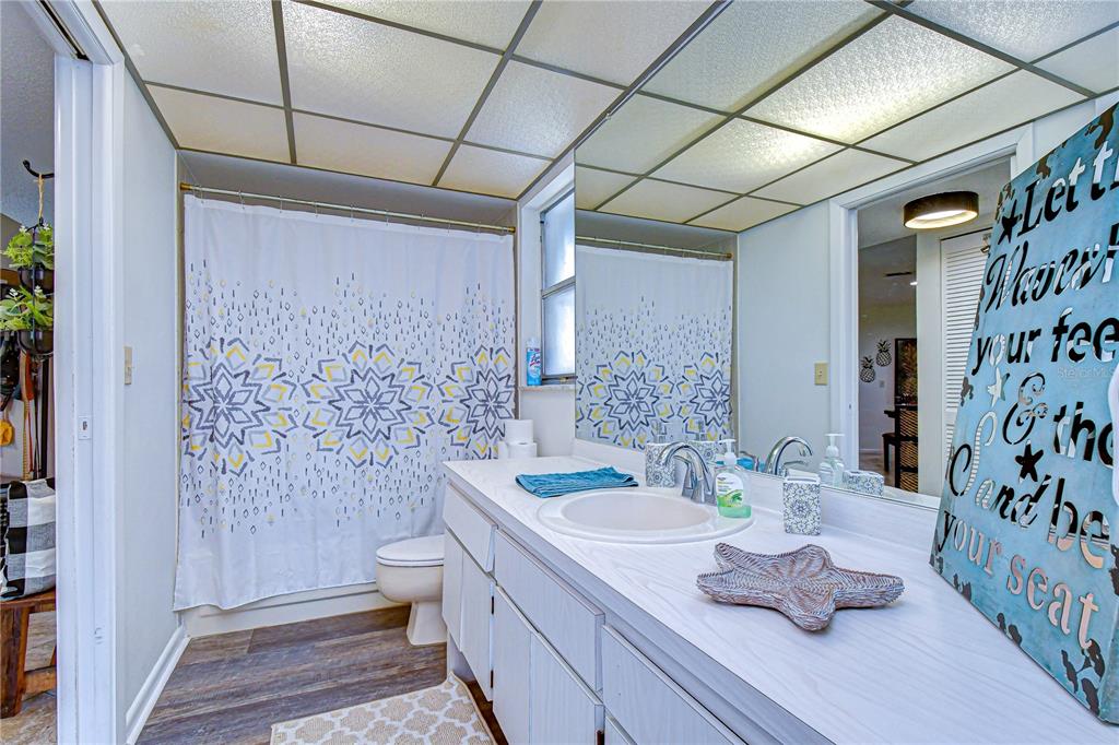 3439 Teeside Drive New Port Richey, FL 34655 - Photo 40 of 85 a bathroom with a granite countertop sink and a mirror