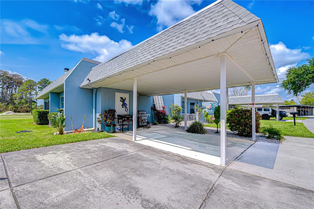 3439 Teeside Drive New Port Richey, FL 34655 - Photo 4 of 85 a view of a house with a yard and plants